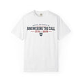 Answering the Call 1776–2026 heritage tee — navy athletic lettering with a shield and star on a light Comfort Colors shirt