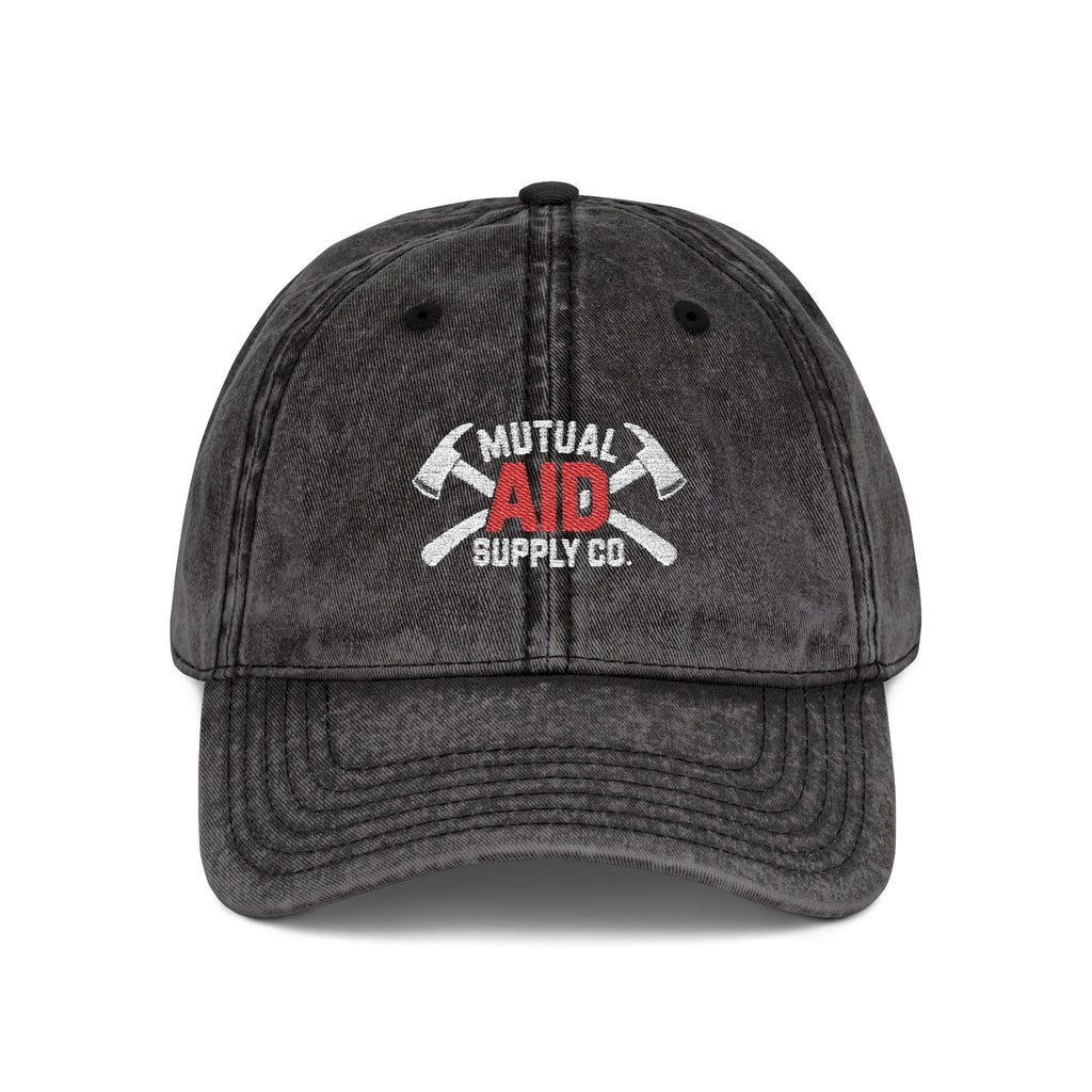Crossed fire axes embroidered on an unstructured dad hat