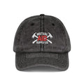 Crossed fire axes embroidered on an unstructured dad hat